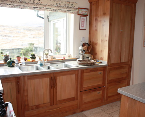 hardwood kitchen with integrated sub-zero fridge freezer